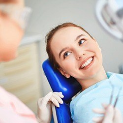 Smiling woman in dental chair