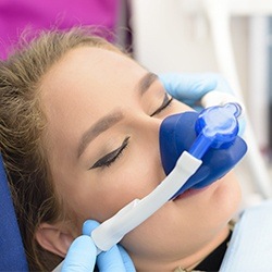 Woman with nitrous oxide nasal mask