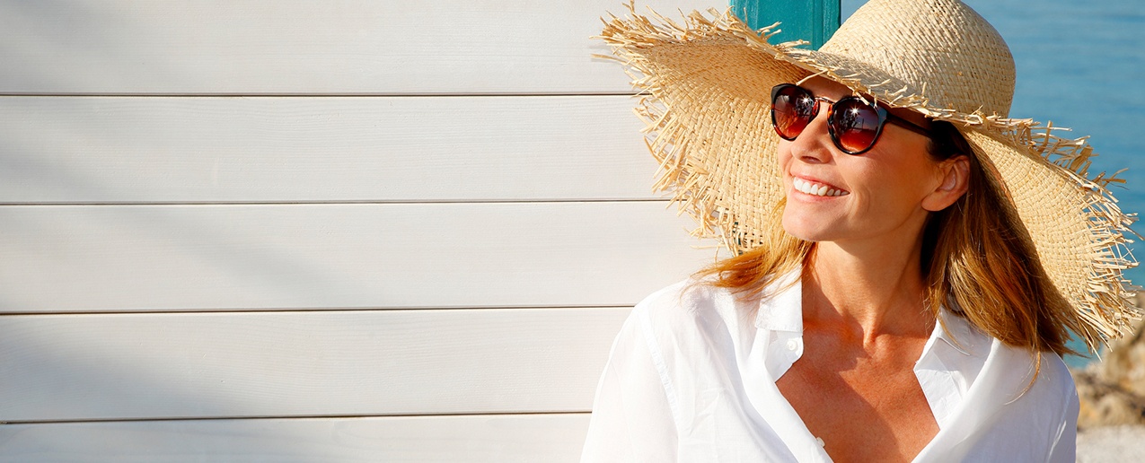 Smiling woman at the beach