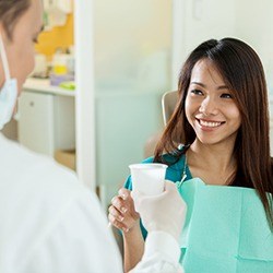 Smiling woman in dental chair