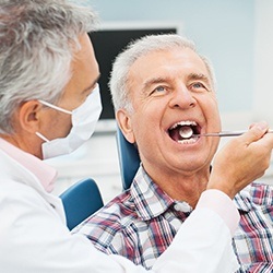 Man receiving dental exam