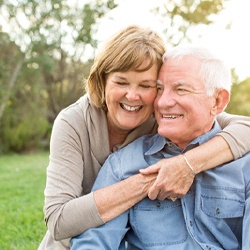 happy couple who are good candidates for dentures