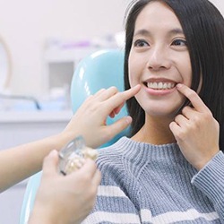 Patient and dentist discussing the cost of Invisalign