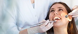 Woman recieving dental checkup