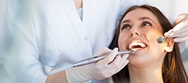 Woman receiving dental checkup