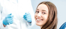 Smiling woman in dental chair