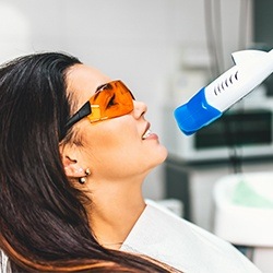 Woman receiving in-office teeth whitening