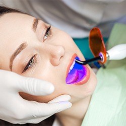 Woman receiving dental bonding