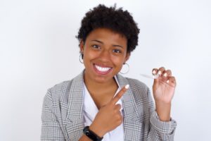 businesswoman with clear aligners